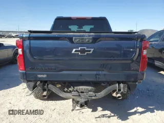 2023 Chevrolet Silverado 1500 LT Trail Boss with VIN 3GCUDFE86PG105669, listed as a Copart auction lot 86084714 with 59,361 mi miles and Salvage Title. Bid and sale history available at DreamBid. Image 6.