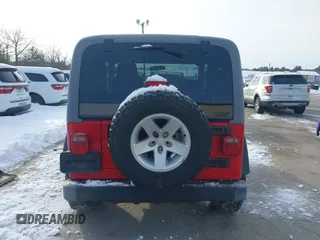 2005 Jeep Wrangler Rubicon with VIN 1J4FA69S25P316085, listed as a IAAI auction lot 41503034 with 57,252 mi miles. Bid and sale history available at carsss.com. Image 16.