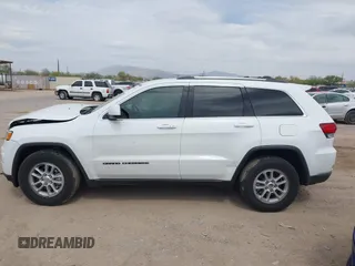 2020 Jeep Grand Cherokee Altitude with VIN 1C4RJEAG7LC328824, listed as a IAAI auction lot 42253946 with 94,035 mi miles and . Bid and sale history available at DreamBid. Image 14.