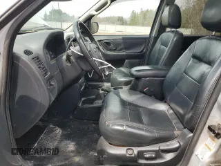 2003 Ford Escape Limited z VIN 1FMCU941X3KC33512, wystawiony jako Copart lot #51029495 z przebiegiem 146 616 mil mil oraz Szkoda całkowita • Salvage title. Historia ofert i sprzedaży dostępna na DreamBid. Obrazek 7.