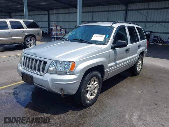 2004 Jeep Grand Cherokee Laredo with VIN 1J4GX48S34C258227, listed as a IAAI auction lot 42616107 with 160,424 mi miles and . Bid and sale history available at DreamBid. Image 2.