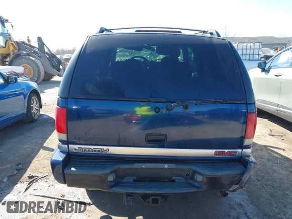 1999 GMC Jimmy SLE with VIN 1GKDT13W3X2553792, listed as a IAAI auction lot 41876489 with 266,884 mi miles. Bid and sale history available at carsss.com. Image 17.