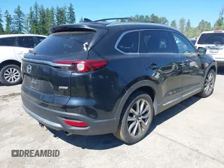 2018 Mazda CX-9 Grand Touring z VIN JM3TCBDY2J0237050, wystawiony jako IAAI lot #42457060 z przebiegiem 130 625 mil mil oraz . Historia ofert i sprzedaży dostępna na DreamBid. Obrazek 4.