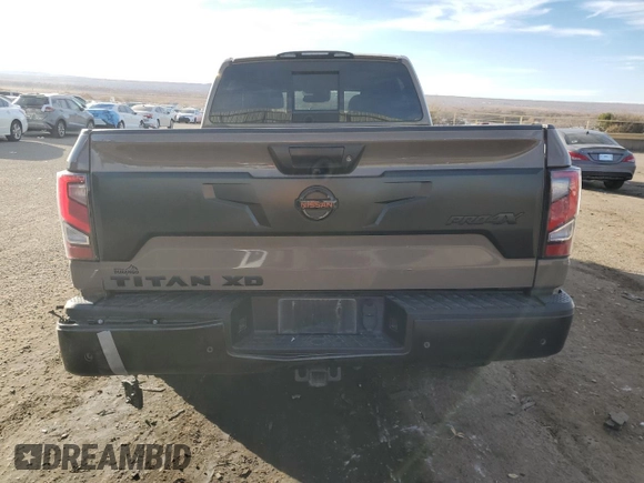 2021 Nissan Titan SV z VIN 1N6AA1FB9MN533034, wystawiony jako Copart lot #81335494 z przebiegiem 71 281 mil mil oraz Szkoda całkowita • Salvage title. Historia ofert i sprzedaży dostępna na DreamBid. Obrazek 6.