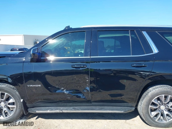 2023 Chevrolet Tahoe LS with VIN 1GNSCMKD9PR157174, listed as a IAAI auction lot 40299056 with 25,588 mi miles. Bid and sale history available at carsss.com. Image 14.