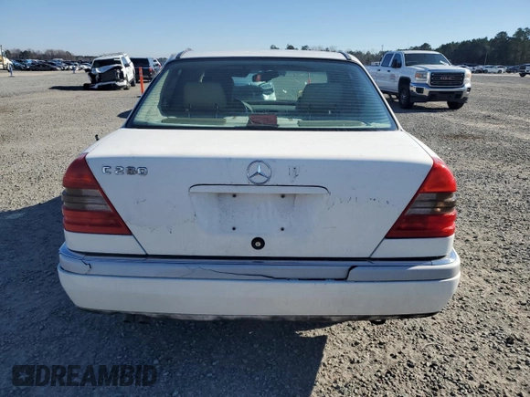 1996 Mercedes-Benz C with VIN WDBHA28E8TF389546, listed as a Copart auction lot 86340144 with 314,364 mi miles and Salvage Title. Bid and sale history available at carsss.com. Image 6.
