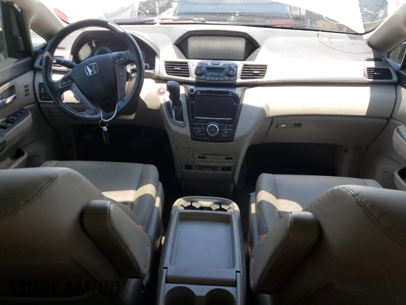 2017 Honda Odyssey Touring with VIN 5FNRL5H94HB007979, listed as a Copart auction lot 56755435 with 125,821 mi miles and Salvage title. Bid and sale history available at DreamBid. Image 8.