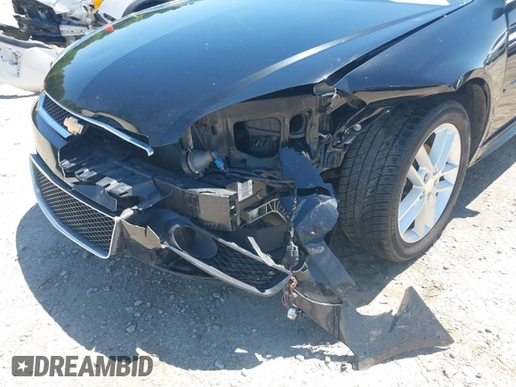 2014 Chevrolet Impala LTZ with VIN 2G1WC5E39E1168726, listed as a IAAI auction lot 42133295 with 146,902 mi miles and . Bid and sale history available at DreamBid. Image 6.