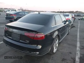 2013 Audi A4 2.0T Prestige with VIN WAUKFAFL9DN015049, listed as a IAAI auction lot 40975645 with 104,407 mi miles. Bid and sale history available at carsss.com. Image 4.