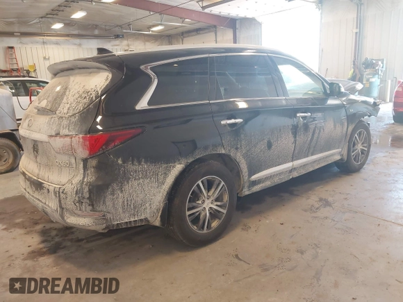 2019 Infiniti QX60 Luxe with VIN 5N1DL0MM6KC548023, listed as a IAAI auction lot 42267143 with 94,231 mi miles and . Bid and sale history available at DreamBid. Image 4.