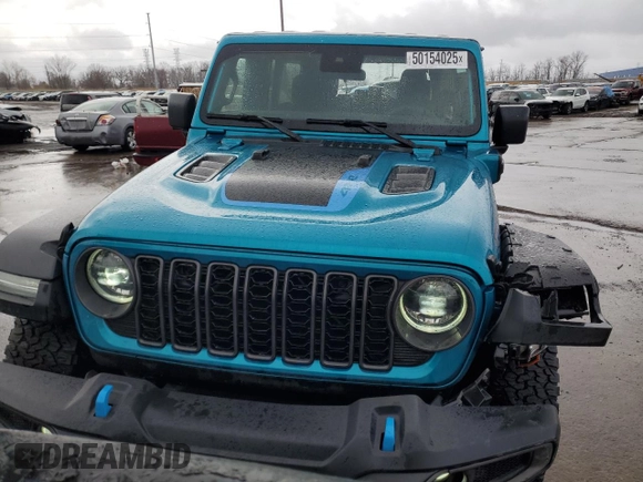 2024 Jeep Wrangler Rubicon X z VIN 1C4RJXR6XRW217098, wystawiony jako Copart lot #50154025 z przebiegiem 15 887 mil mil oraz Czysty tytuł • Clean title. Historia ofert i sprzedaży dostępna na DreamBid. Obrazek 5.