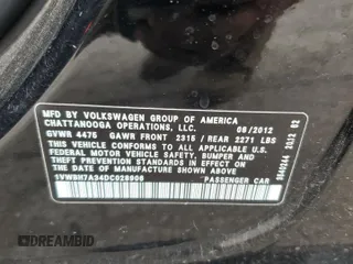 2013 Volkswagen Passat SE z VIN 1VWBH7A34DC028906, wystawiony jako Copart lot #58210265 z przebiegiem 294 953 mil mil oraz Szkoda całkowita • Salvage title. Historia ofert i sprzedaży dostępna na DreamBid. Obrazek 12.