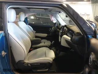 2024 MINI Hardtop 2 Door Cooper S with VIN WMW53DH08R2U74513, listed as a IAAI auction lot 40993803 with 7,817 mi miles. Bid and sale history available at carsss.com. Image 5.