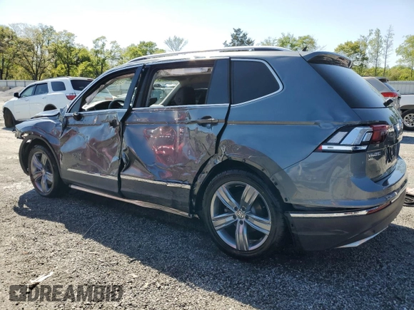 2020 Volkswagen Tiguan SE z VIN 3VV3B7AX8LM102502, wystawiony jako Copart lot #52428635 z przebiegiem 50 778 mil mil oraz Szkody całkowita. Historia ofert i sprzedaży dostępna na DreamBid. Obrazek 2.