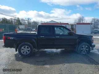 2012 Chevrolet Colorado LT w/2LT with VIN 1GCHTDFE5C8100654, listed as a IAAI auction lot 41213103 with 230,065 mi miles. Bid and sale history available at carsss.com. Image 13.