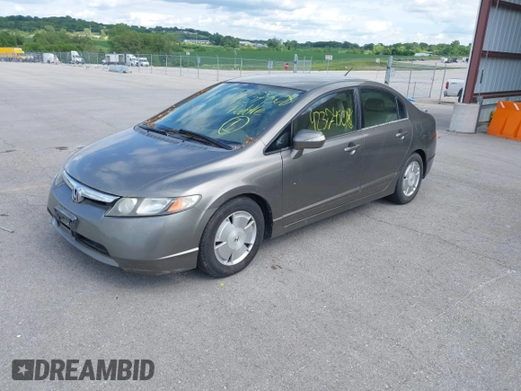 2006 Honda Civic z VIN JHMFA36246S000063, wystawiony jako IAAI lot #42374508 z przebiegiem 145 891 mil mil oraz . Historia ofert i sprzedaży dostępna na DreamBid. Obrazek 2.