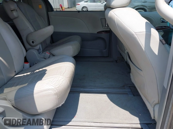 2012 Toyota Sienna XLE AAS with VIN 5TDYK3DCXCS202574, listed as a IAAI auction lot 42714762 with 234,287 mi miles and . Bid and sale history available at DreamBid. Image 8.