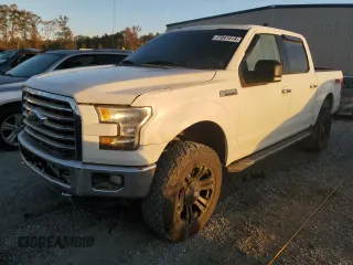 2015 Ford F-150 XLT with VIN 1FTEW1EFXFFB04685, listed as a Copart auction lot 77041514 with 161,088 mi miles and Salvage Title. Bid and sale history available at carsss.com. Image 1.