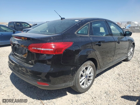 2018 Ford Focus SE with VIN 1FADP3F29JL262175, listed as a Copart auction lot 69452444 with 105,830 mi miles and Salvage Title. Bid and sale history available at carsss.com. Image 3.