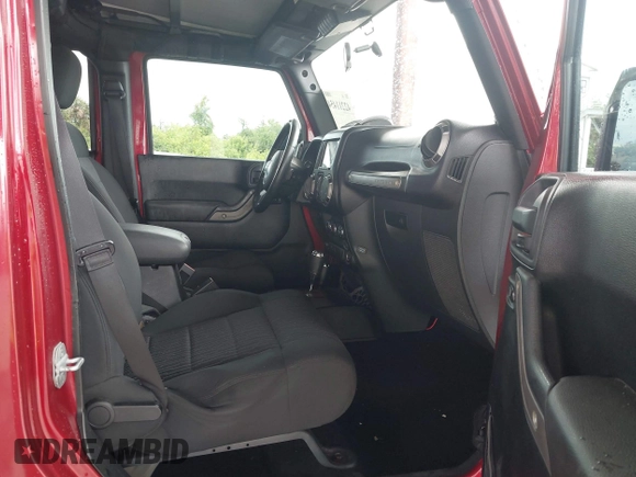2012 Jeep Wrangler Unlimited Sport z VIN 1C4BJWDG3CL207291, wystawiony jako IAAI lot #42211454 z przebiegiem 110 864 mil mil oraz . Historia ofert i sprzedaży dostępna na DreamBid. Obrazek 5.