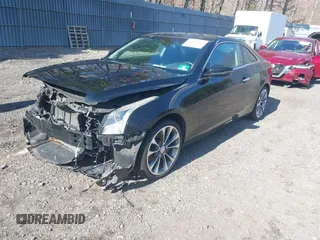 2016 Cadillac ATS Luxury Collection RWD z VIN 1G6AB1RX9G0194349, wystawiony jako IAAI lot #41882442 z przebiegiem 52 676 mil mil oraz . Historia ofert i sprzedaży dostępna na DreamBid. Obrazek 2.
