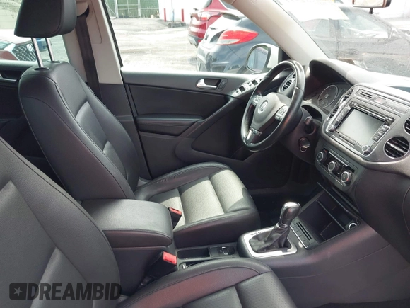2012 Volkswagen Tiguan SE with VIN WVGAV7AX9CW607960, listed as a IAAI auction lot 42679977 with 106,335 mi miles and . Bid and sale history available at DreamBid. Image 5.