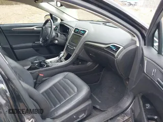 2014 Ford Fusion SE with VIN 3FA6P0HD4ER290169, listed as a IAAI auction lot 41881889 with 124,777 mi miles. Bid and sale history available at carsss.com. Image 5.