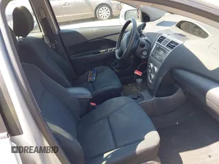 2012 Toyota Yaris with VIN JTDBT4K30CL026518, listed as a IAAI auction lot 42842689 with 123,346 mi miles and . Bid and sale history available at DreamBid. Image 5.