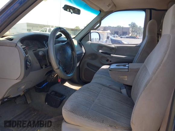 1997 Ford F-150 XL with VIN 1FTDX18W4VKC95711, listed as a IAAI auction lot 42197302 with 287,660 mi miles and . Bid and sale history available at DreamBid. Image 5.