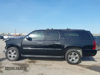 2011 Chevrolet Suburban LTZ with VIN 1GNSCKE03BR117338, listed as a IAAI auction lot 41878479 with 182,327 mi miles. Bid and sale history available at carsss.com. Image 13.