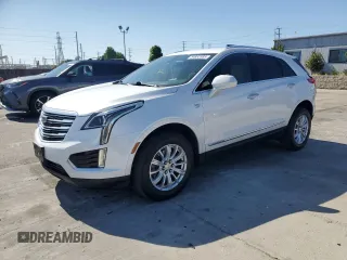 2019 Cadillac XT5 FWD with VIN 1GYKNARS1KZ121732, listed as a Copart auction lot 54882885 with 72,142 mi miles and Salvage title. Bid and sale history available at DreamBid. Image 1.