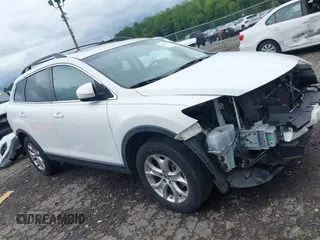 2015 Mazda CX-9 Touring with VIN JM3TB2CA6F0469620, listed as a IAAI auction lot 42447485 with 113,428 mi miles and . Bid and sale history available at DreamBid. Image 1.