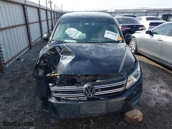 2017 Volkswagen Tiguan S with VIN WVGAV7AX5HK053010, listed as a IAAI auction lot 41658698 with 72,802 mi miles. Bid and sale history available at carsss.com. Image 12.