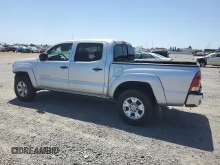 2007 Toyota Tacoma PreRunner with VIN 3TMJU62N77M028907, listed as a Copart auction lot 59622695 with 186,339 mi miles and Salvage title. Bid and sale history available at DreamBid. Image 2.
