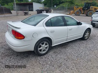 2004 Oldsmobile Alero GL1 z VIN 1G3NL52E04C242312, wystawiony jako IAAI lot #42361543 z przebiegiem 139 438 mil mil oraz . Historia ofert i sprzedaży dostępna na DreamBid. Obrazek 4.