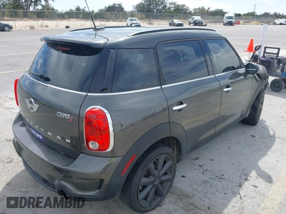2014 MINI Countryman S with VIN WMWZC3C55EWP25697, listed as a IAAI auction lot 41797132 with Not Provided miles and . Bid and sale history available at DreamBid. Image 4.