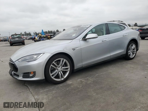 2014 Tesla Model S 60 with VIN 5YJSA1H14EFP34335, listed as a Copart auction lot 65504325 with Not provided miles and Clean title. Bid and sale history available at DreamBid. Image 1.