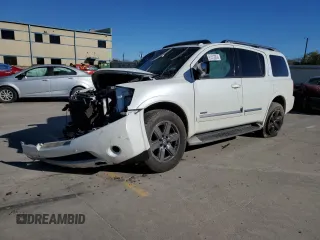 2014 Nissan Armada Platinum z VIN 5N1BA0NF4EN600464, wystawiony jako Copart lot #81412324 z przebiegiem Nie podano mil oraz Szkoda całkowita • Salvage title. Historia ofert i sprzedaży dostępna na DreamBid. Obrazek 1.