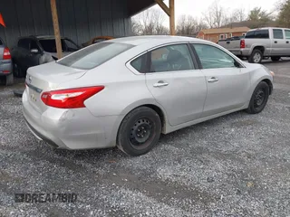 2016 Nissan Altima S with VIN 1N4AL3AP4GN308364, listed as a IAAI auction lot 41585030 with 211,098 mi miles and . Bid and sale history available at DreamBid. Image 4.