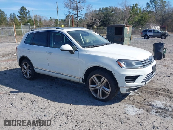 2016 Volkswagen Touareg Sport with VIN WVGEF9BP5GD012680, listed as a IAAI auction lot 41610943 with 153,952 mi miles and . Bid and sale history available at DreamBid. Image 1.