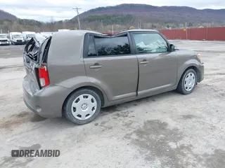 2014 Scion xB with VIN JTLZE4FE9EJ050596, listed as a IAAI auction lot 41884572 with 141,896 mi miles. Bid and sale history available at carsss.com. Image 4.