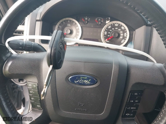 2011 Ford Escape XLT with VIN 1FMCU9DG9BKC38929, listed as a IAAI auction lot 41784854 with 216,201 mi miles. Bid and sale history available at carsss.com. Image 11.