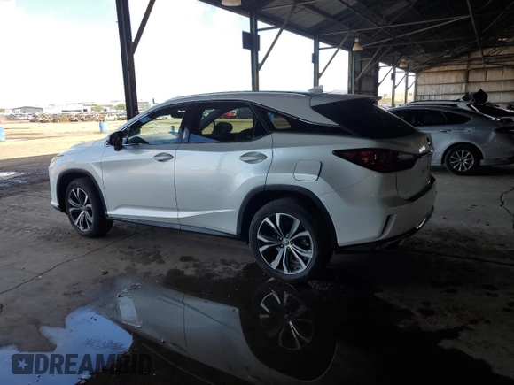 2016 Lexus RX 350 with VIN 2T2ZZMCA5GC006851, listed as a Copart auction lot 59030245 with 84,091 mi miles and Salvage title. Bid and sale history available at DreamBid. Image 2.
