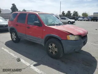 2002 Ford Escape XLT Choice with VIN 1FMYU03142KC38481, listed as a Copart auction lot 51339155 with 228,763 mi miles and Salvage Title. Bid and sale history available at carsss.com. Image 4.