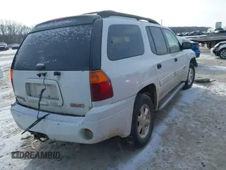 2004 GMC Envoy XL SLE with VIN 1GKET16S046229037, listed as a IAAI auction lot 41369595 with 178,729 mi miles. Bid and sale history available at carsss.com. Image 4.