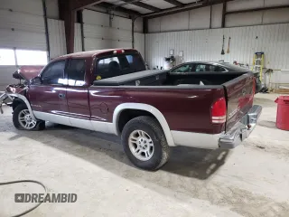 2001 Dodge Dakota Sport z VIN 1B7GG22NX1S172265, wystawiony jako Copart lot #42190165 z przebiegiem 109 799 mil mil oraz Szkoda całkowita • Salvage title. Historia ofert i sprzedaży dostępna na DreamBid. Obrazek 2.