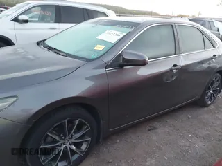 2015 Toyota Camry XLE with VIN 4T1BF1FK1FU895551, listed as a IAAI auction lot 40253286 with 221,273 mi miles and . Bid and sale history available at DreamBid. Image 14.