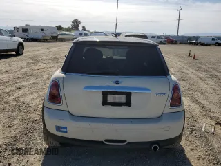 2010 MINI Hardtop with VIN WMWMF3C5XATZ66863, listed as a Copart auction lot 55695585 with 59,294 mi miles and Clean Title. Bid and sale history available at DreamBid. Image 6.