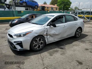 2021 Kia Forte LXS with VIN 3KPF24AD1ME334550, listed as a Copart auction lot 58442565 with 63,556 mi miles and Salvage title. Bid and sale history available at DreamBid. Image 1.