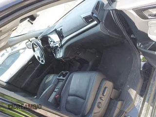 2021 Honda Odyssey Touring with VIN 5FNRL6H84MB027396, listed as a IAAI auction lot 42616650 with 67,207 mi miles and . Bid and sale history available at DreamBid. Image 5.